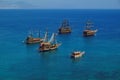 Tourist sail boats in turquoise waters of the Mediterranean sea beside the Turkish ancient fortress Alanya. Antalya Royalty Free Stock Photo