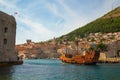 Tourist sailing ship entering the old town port of Dubrovnik in Croatia