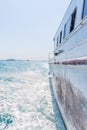 Tourist by sailing on turquoise ocean by ship