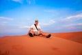 Tourist on a sand dunes Royalty Free Stock Photo