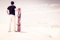 Tourist Sand Skiing In The Desert Royalty Free Stock Photo