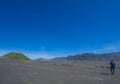 Tourist in savanna of Tengger caldera at Mt. Bromo