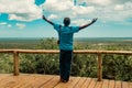 A tourist at a scenic view point at Nyari View Point in Arabuko Sokoke Forest Reserves in Malindi, Kenya Royalty Free Stock Photo