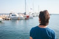 Tourist in seaport. Yachts in the parking lot, seaport in Odessa, Black Sea. Sailing, rich lifestyle, beach holidays Royalty Free Stock Photo