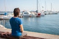 Tourist in seaport. Yachts in the parking lot, seaport in Odessa, Black Sea. Sailing, rich lifestyle, beach holidays Royalty Free Stock Photo