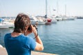 Tourist in seaport. Yachts in the parking lot, seaport in Odessa, Black Sea. Sailing, rich lifestyle, beach holidays Royalty Free Stock Photo