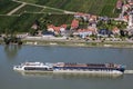 Tourist ship on Danube river against Durnstein village in Wachau valley, Unesco world heritage site in Lower Austria, Austria Royalty Free Stock Photo