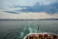 Tourist ship sails on the Bosphor in the nice Istanbul center Royalty Free Stock Photo