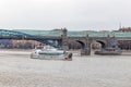 Tourist ship sails on the Moscow River under the pedestrian bridge Royalty Free Stock Photo