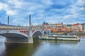 The tourist ship on Vltava River at the Manes Bridge, Prague, Czechia Royalty Free Stock Photo