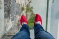 Tourist in shoe covers on glass pathway in Tianmenshan nature pa Royalty Free Stock Photo