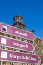 Tourist sign in front of the salt graduation tower in Bad Salzelmen