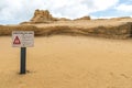 Tourist sign informing about limestone risk area