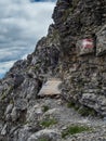 Tourist sign marked via ferrata rock climbing route on the Zugspitze mountain Tyrol, Austria, at Wiener-Neustadter Hutte