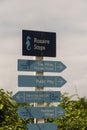 Tourist sign post, direction signs for tourists on Herm island, Guernsey, UK Royalty Free Stock Photo