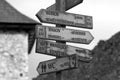 Tourist signpost with distances in kilometers and hours Royalty Free Stock Photo