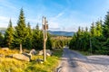 Tourist signpost in the middle of mountain landscape, Giant Mountains, Krkonose, Czech Republic