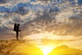 Tourist silhouette on a mountain top