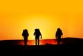 Tourist silhouettes at sunset Royalty Free Stock Photo