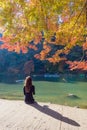 Tourist sitting and relaxing with beautiful nature view of Arashiyama