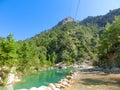 Tourist sliding on a zip line in the canyon of Harmony, near the town of Goynuk and Antalya