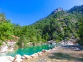 Tourist sliding on a zip line in the canyon of Harmony, near the town of Goynuk and Antalya