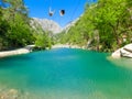 Tourist sliding on a zip line in the canyon of Harmony, near the town of Goynuk and Antalya