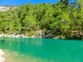 Tourist sliding on a zip line in the canyon of Harmony, near the town of Goynuk and Antalya