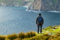 Tourist at Slieve League, Irelands highest sea cliffs, located in south west Donegal along this magnificent costal driving route. Royalty Free Stock Photo