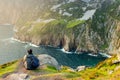 Tourist at Slieve League, Irelands highest sea cliffs, located in south west Donegal along this magnificent costal driving route. Royalty Free Stock Photo