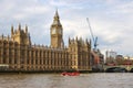 Tourist speed boat passing in front of the Palace of Westminster, houses of parliament, big ben London Royalty Free Stock Photo
