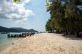 Tourist spend time at a beach in Pulau Beras Basah in Langkawi in sunny day