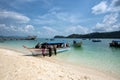 Tourist spend time at a beach in Pulau Beras Basah in Langkawi in sunny day.