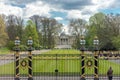 A tourist standing in front of the golden gates of the royal palace in Brussels, Belgium Royalty Free Stock Photo