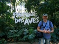 Tourist standing at Parque Das Aves