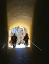 tourist on the steps in old historic alley in the medieval village of Anghiari near city of Arezzo in Tuscany, Italy Royalty Free Stock Photo