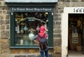 Tourist Stood Outside The Oldest Sweet Shop in England.