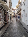 Narrow street with tourist stores - Cordoba, Spain