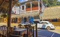 Tourist street restaurants houses people cars hotels stores Mazunte Mexico Royalty Free Stock Photo