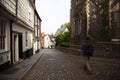 A tourist in the streets of Norwich