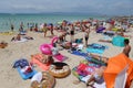 Tourist sunbathe or bath on the sea in El Arenal beach in Mallorca Royalty Free Stock Photo