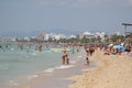 Tourist sunbathe or bath on the sea in El Arenal beach in Mallorca Royalty Free Stock Photo