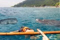 Tourist swim in the sea with whale sharks Royalty Free Stock Photo