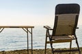 Tourist table and chair on coast