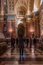 Budapest, Hungary - Feb 8, 2020: Tourist take photo inside St. Stephen Basilica nave