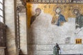 Tourist takes photo of Jesus Christ Pantocrator,Detail from deesis Byzantine mosaic in Hagia Sophia in Istanbul, Turkey,March,11 Royalty Free Stock Photo