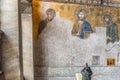 Tourist takes photo of Jesus Christ Pantocrator,Detail from deesis Byzantine mosaic in Hagia Sophia in Istanbul, Turkey,March,11 Royalty Free Stock Photo