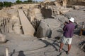 A tourist takes a photograph of the Unfinished Obelisk at the ancient Western Quarry near Aswan in Egypt.