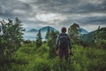 Tourist takes a snapshot of the Batur volcano from Kintamani, Ba