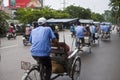 Tourist taking a cyclo ride